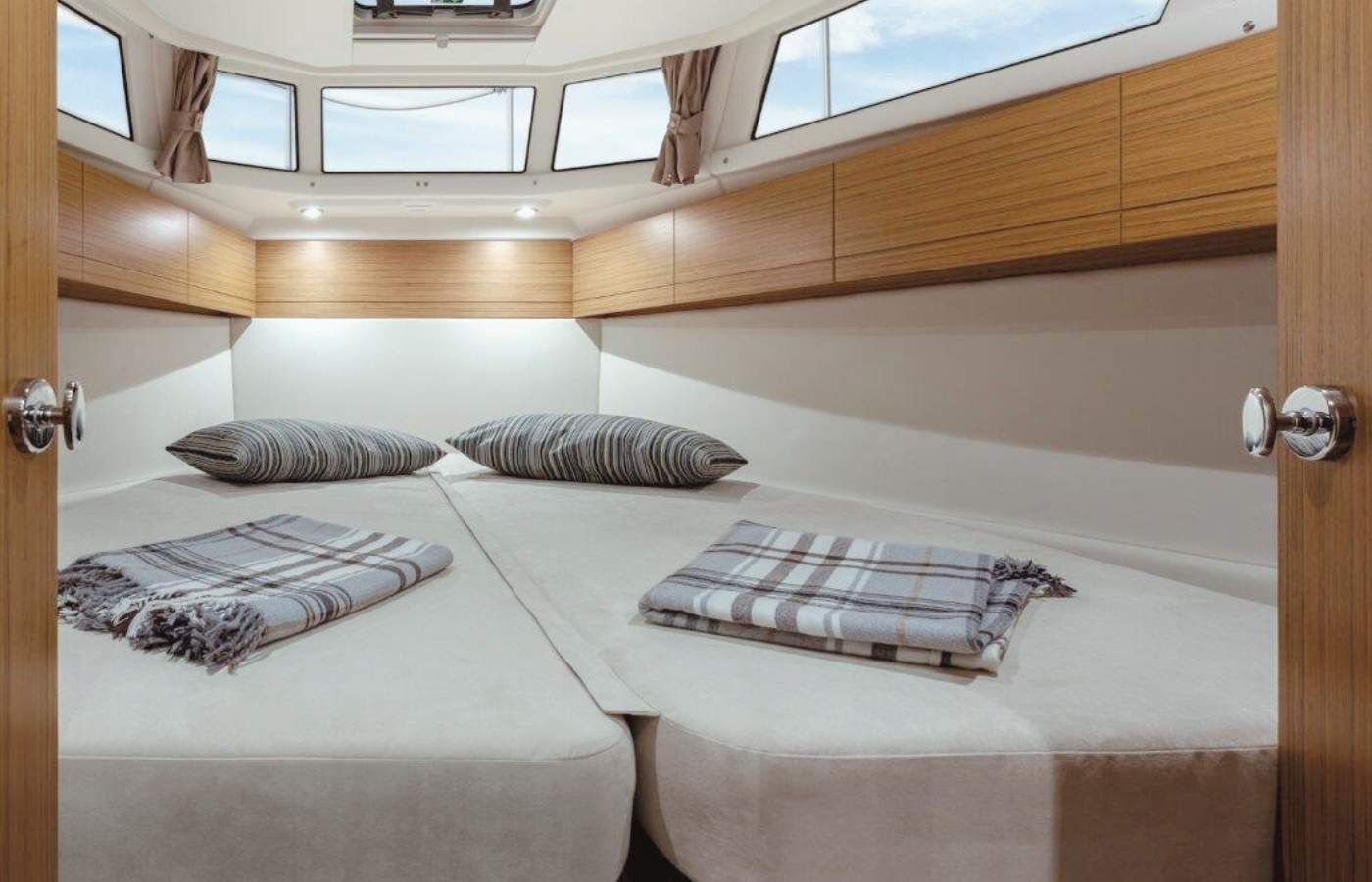 Greenline 33 master bedroom on board a boat